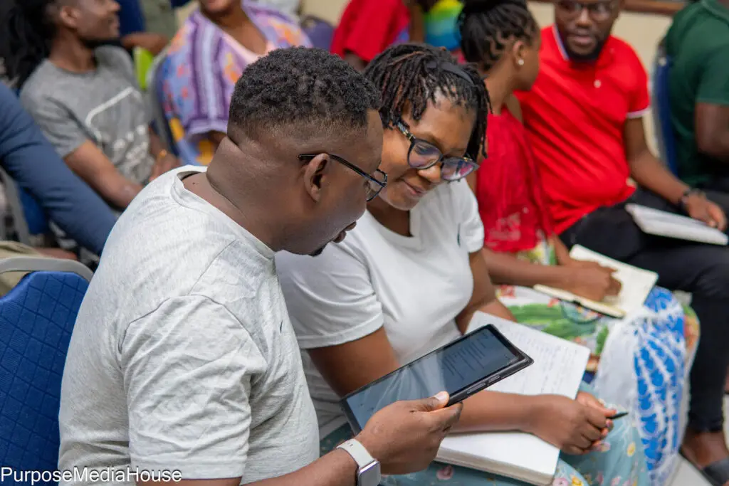 couple looking at a tablet