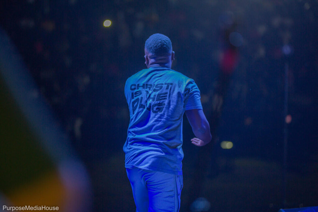 artist man in blue light, performing